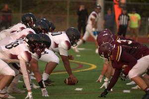The defensive line for the South Kitsap Wolves anxiously awaits the snap of the football against Bethel. Elisha Meyer/Port Orchard Independent Photos