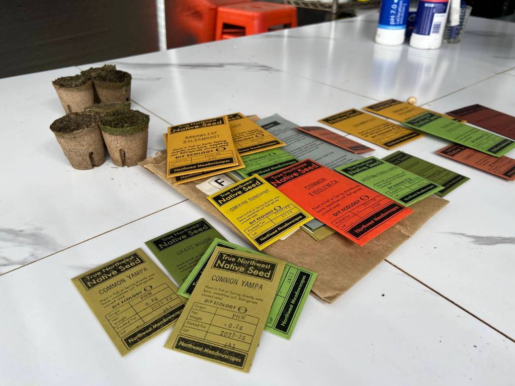 Packets of native plant seeds.