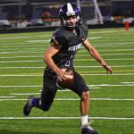 NK QB Cole Edwards threw for three touchdowns against Bainbridge in the Agate Cup. Nicholas Zeller-Singh/Kitsap News Group Photos