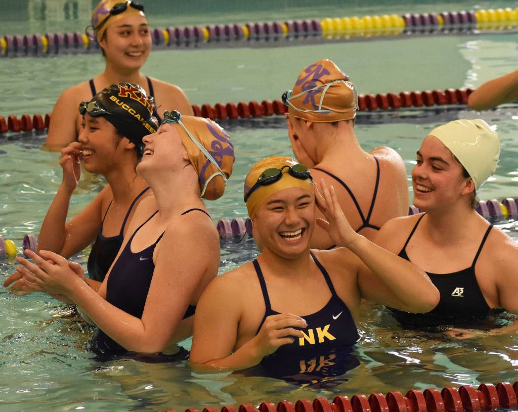 Kingston and North Kitsap cheer each other before the swim meet begins.