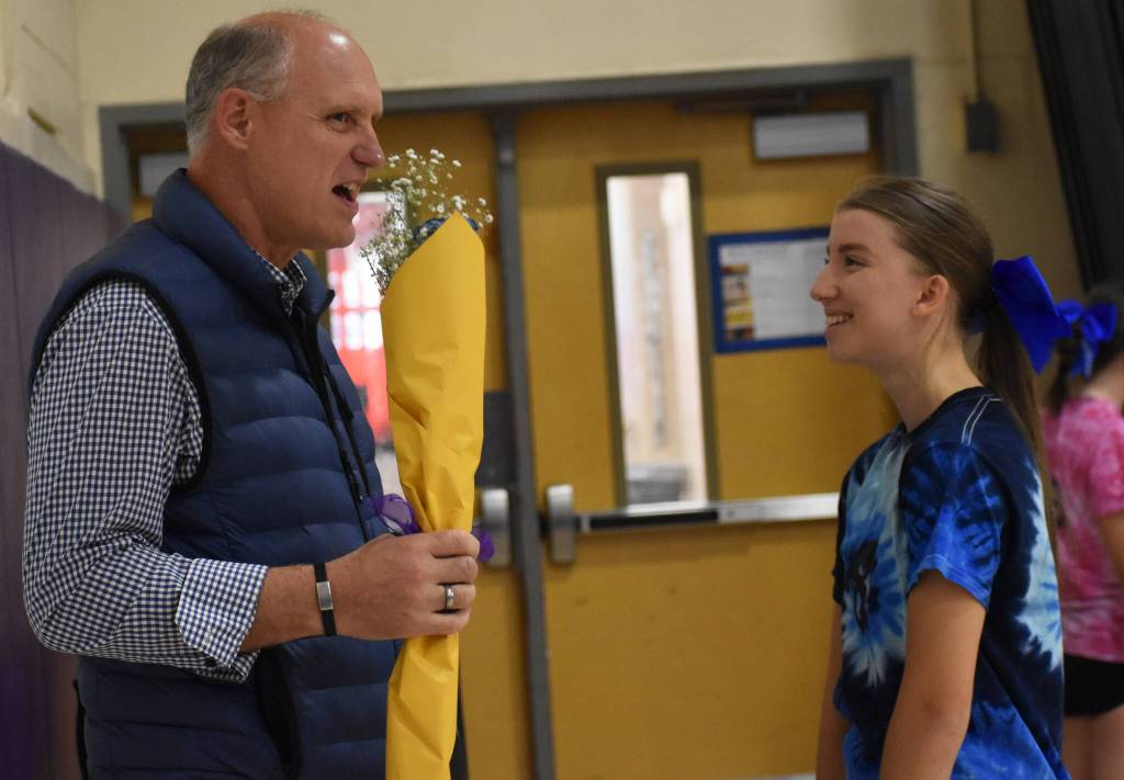 Each volleyball player had the opportunity to hand a bouquet of flowers to their sponsor before or after the game.