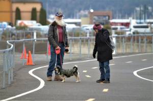 Two people stop to talk while taking a stroll down the Bay Street Pedestrian Pathway. Elisha Meyer/Kitsap News Group