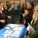 Kristen Jewell talks with visitors about the homeless shelter coming to Port Orchard. Mike De Felice/Kitsap News Group Photos