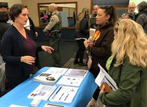 Kristen Jewell talks with visitors about the homeless shelter coming to Port Orchard. Mike De Felice/Kitsap News Group Photos