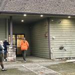 Visitors arrive at the Open House at the former fitness center, which will be remodeled into a homeless shelter.