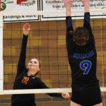 Kylie Sandstrom looks to get the ball past North Masons Teegan Skionsby.