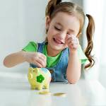 child with piggy bank