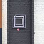 The new logo for the Town Square on the outside of the building.