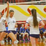 Maddie Pryde (11) of NK celebrates a point with her team. Steve Powell/Kitsap News Group Photos