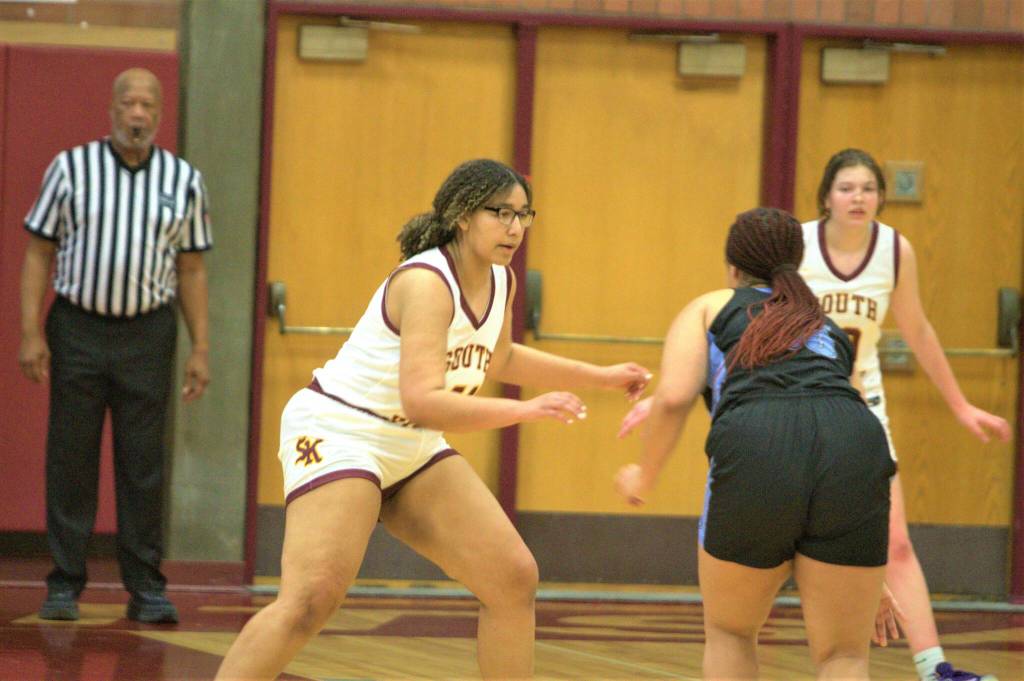Junior Gabrielle Lafrazier moves with the ballhandler while on defense.