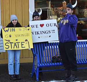 Carter Dungys family and friends cheered the team as they were escorted through downtown Poulsbo early Dec. 3. Nicholas Zeller-Singh/Kitsap News Group Photos.