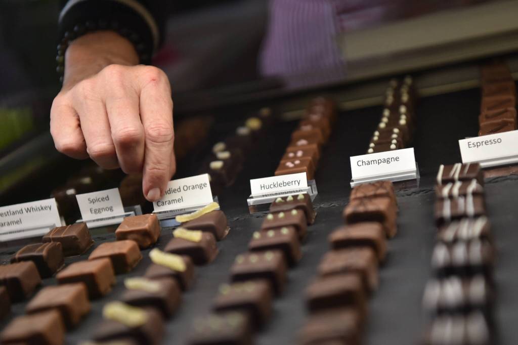 Handmade ChocMo chocolates fill a display case at LAtelier TR.