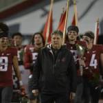 Mike Leach leading his team onto the field on Senior Night.