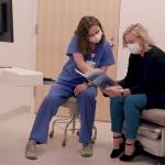 A nurse goes over a chart.