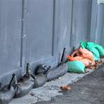 Sandbags line the garage entrance days after floodwaters entered the building.