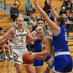 Bella Ramirez and the Spartans survive an Olympic comeback by defeating the Trojans 36-31. Nicholas Zeller-Singh/Kitsap News Group Photos