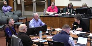 Loren Bast (far left), executive director of Bainbridge Prepares, former Bainbridge firefighter Luke Carpenter (left), Poulsbo Mayor Becky Erickson (right) and the City Council discuss the citys emergency preparednes. Courtesy Photo
