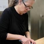 Sweet & Savories owner Eileen France preparing food.