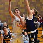 Spartan Noah Walter makes his presence felt in the paint.