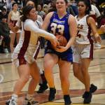Tulip Carter powers through Kingstons defense for the layup.
