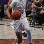 Harry Davies prepares to take flight for the dunk.