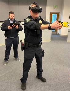 Mike De Felice/Kitsap News Group Photos
Trainer Andy Brandon sets up situation while police chief Matt Brown reacts.