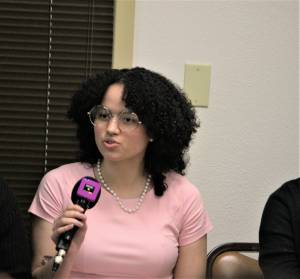 A student with the Kitsap Black Student Union performs the role of Rosa Parks in a skit. Elisha Meyer/Kitsap News Group