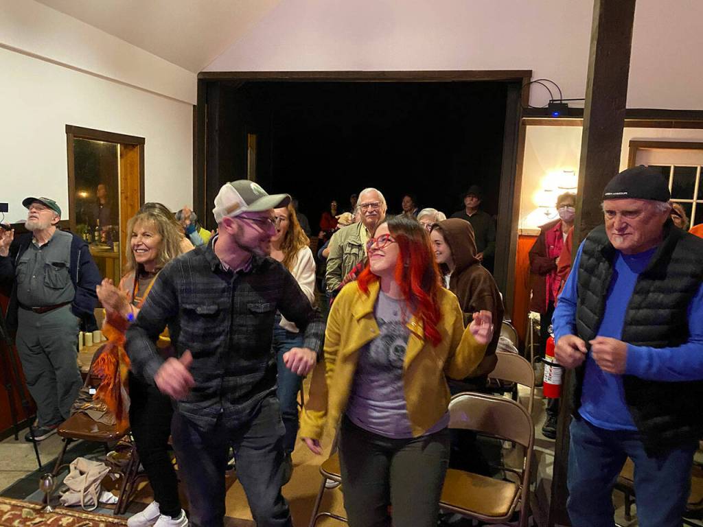 People dance to the music inside Auntmamas Stage 3.