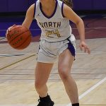Jade Sunnenberg dribbles the ball up the court.