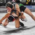 Mya Young turns her opponent before beating her.