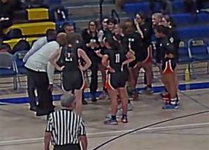 The Central Kitsap girls basketball team huddles up after trailing at halftime. Courtesy Photos