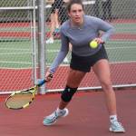 Bainbridges Cece Combs looks to return the ball to her opponent. Nicholas Zeller-Singh/Kitsap News Group Photos
