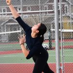 Bainbridges Izzy Wallin serves the ball to her opponent.