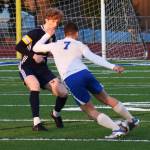 Bremertons Brennan Galloway jukes the Bainbridge defender and attacks the goal.