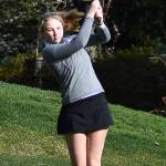 Bainbridges Clarice Telschow watches her shot reach the green on a par 3.