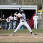 Senior Braydon Olson loads up on a swing that would provide the Wolves with their first run of the game. Elisha Meyer/Kitsap News Group Photos