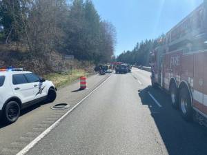 Officials respond to the crash site involving a stolen pickup from Tacoma. State Patrol courtesy photo