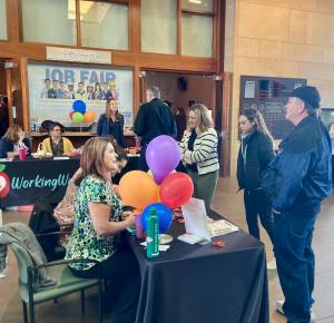 County employees welcome visitors to the Kitsap Job Fair in Port Orchard. Elisha Meyer/Kitsap News Group