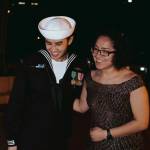 This couple stands out even more while rocking the look of their bright orange life jackets. Photos courtesy of Britt Jezak
This pair manages a smile during an impromptu photo shoot aboard the Walla Walla.