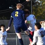 Zach Schramling scores the first goal of the game on a header. Nicholas Zeller-Singh/Kitsap News Group Photos