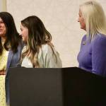 North Kitsap High School senior Julia Beatty (middle) is honored for her leadership.