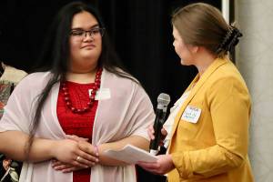 Kingston High School sophomore Viapaia Woo-Ching (left) is honored for her leadership at the annual Regional Awards Ceremony for the Washington Association of School Administrators. NKSD courtesy photos.