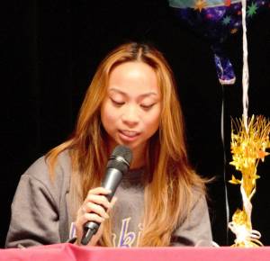 Senior dancer Jiselle Javier thanks her coaches and teammates during her portion of the signing day celebration. Elisha Meyer/Kitsap News Group