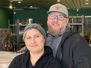 Karena and Jared Fagan stand in the future home of Find the Path Books. Elisha Meyer/Kitsap News Group