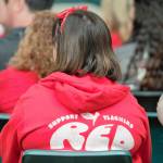 An audience member wearing red in support of teachers attends the special session of the South Kitsap School District board. Elisha Meyer/Kitsap News Group Photos