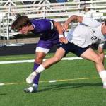 Mason Chmielewski fights for a ball at midfield. Nicholas Zeller-Singh/Kitsap News Group Photos