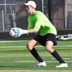 Trevor Dill saves a ball coming at him.