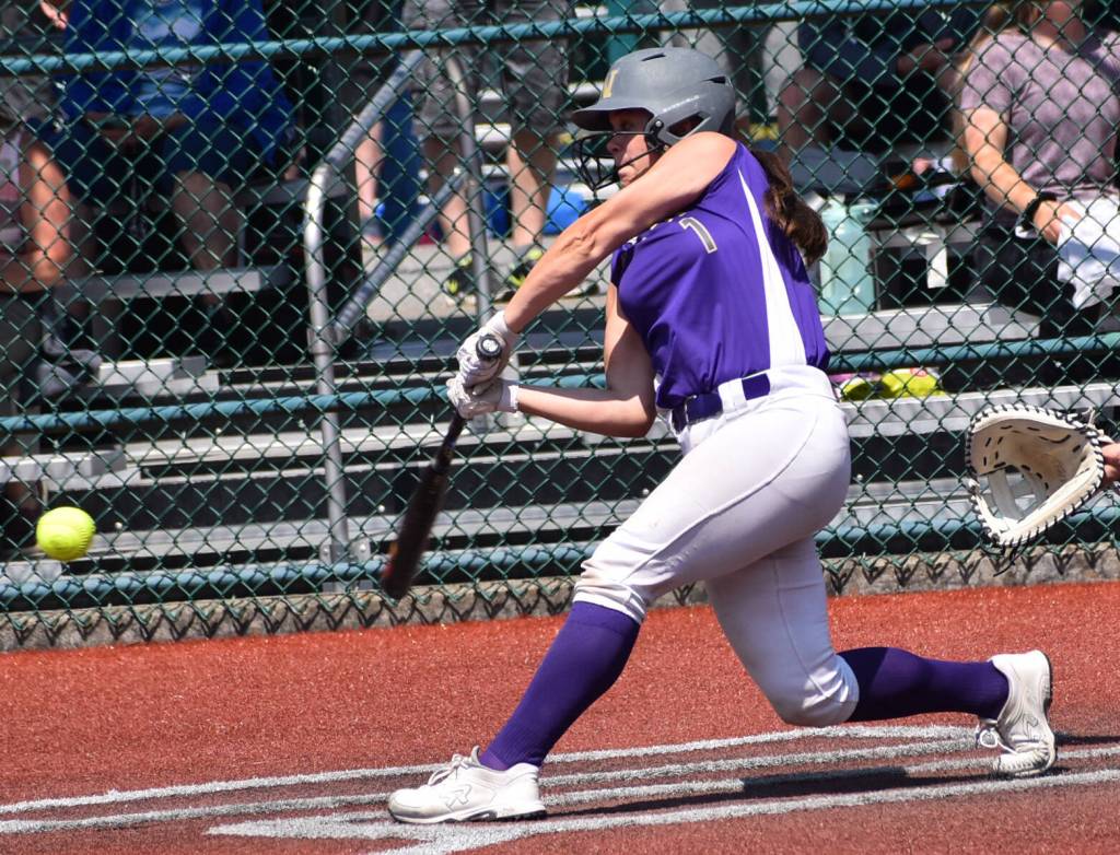 North Kitsaps Mackenzie Phillips hits a home run against White River.