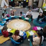 Lauren Moon, S'Klallam volunteer, reads a cultural book during story time. Port Gamble S'Klallam Tribe courtesy photos