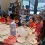 Students make frybread with big kid helpers and S'Klallam elder, Betty Fulton.